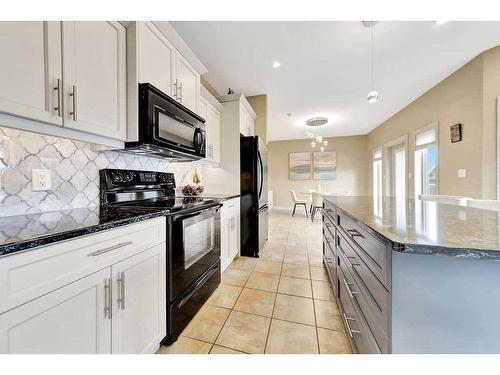 1620 53A Avenue Close, Lloydminster, AB - Indoor Photo Showing Kitchen With Upgraded Kitchen