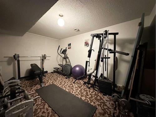 1640 5A Avenue, Wainwright, AB - Indoor Photo Showing Gym Room