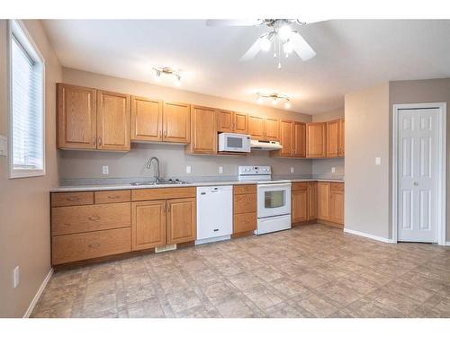 6608 39 Street, Lloydminster, AB - Indoor Photo Showing Kitchen With Double Sink