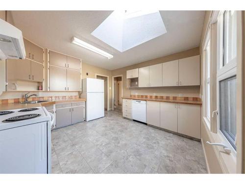 5203 46 Street, Lloydminster, AB - Indoor Photo Showing Kitchen With Double Sink