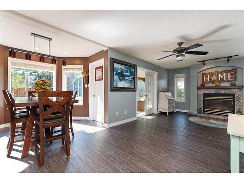 2606 51 Avenue, Lloydminster, AB - Indoor Photo Showing Dining Room With Fireplace