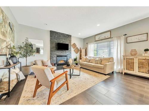 2023 56 Avenue, Lloydminster, AB - Indoor Photo Showing Living Room With Fireplace