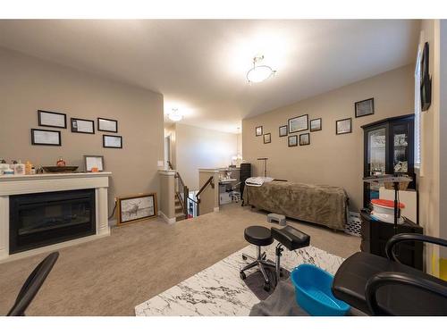 7309 35 Street, Lloydminster, AB - Indoor Photo Showing Living Room With Fireplace