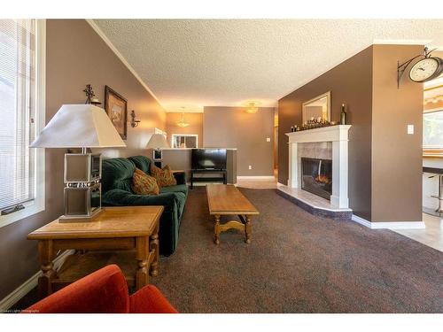 4906 58 Avenue, Lloydminster, AB - Indoor Photo Showing Living Room With Fireplace