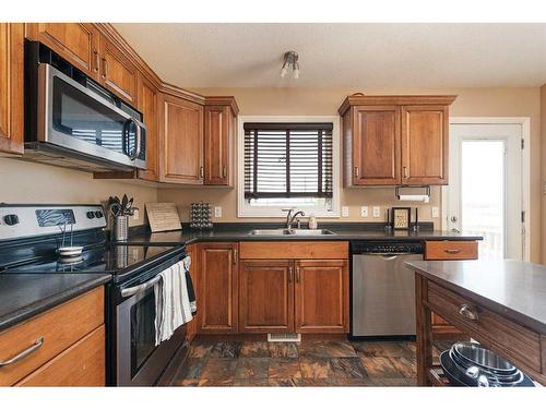 5302 50 Street, Kitscoty, AB - Indoor Photo Showing Kitchen With Double Sink