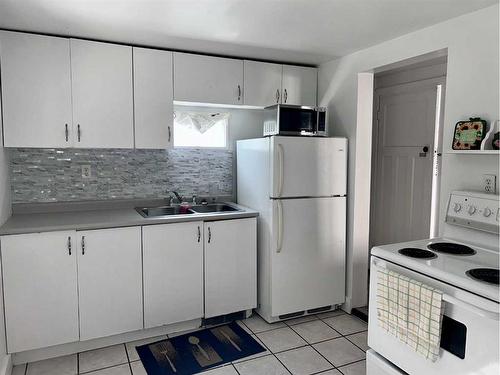 5310 46 Avenue, Vermilion, AB - Indoor Photo Showing Kitchen With Double Sink