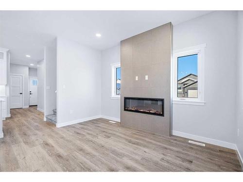 1315 56 Avenue, Lloydminster, AB - Indoor Photo Showing Living Room With Fireplace