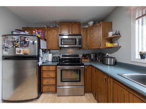 21 Silver Willow Estates 12 Cherry Lane Rr13, Rural Vermilion River, County Of, AB - Indoor Photo Showing Kitchen