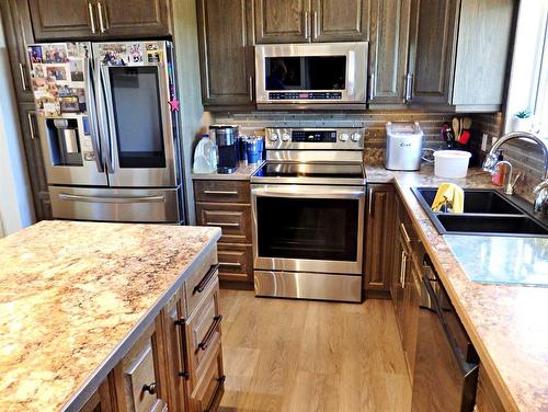 525066 Rr 53, Rural Vermilion River, County Of, AB - Indoor Photo Showing Kitchen With Double Sink