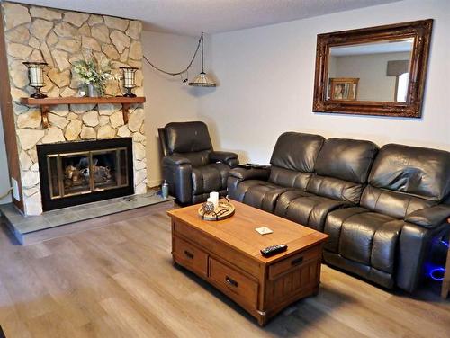 525066 Rr 53, Rural Vermilion River, County Of, AB - Indoor Photo Showing Living Room With Fireplace