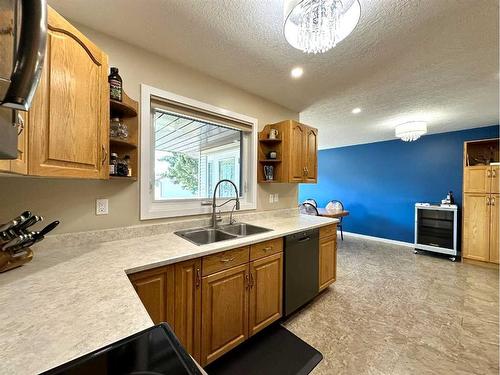 1805 10 Avenue, Wainwright, AB - Indoor Photo Showing Kitchen With Double Sink