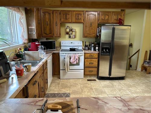 Ne25-53-19-W3 K, Turtle Lake, SK - Indoor Photo Showing Kitchen With Double Sink