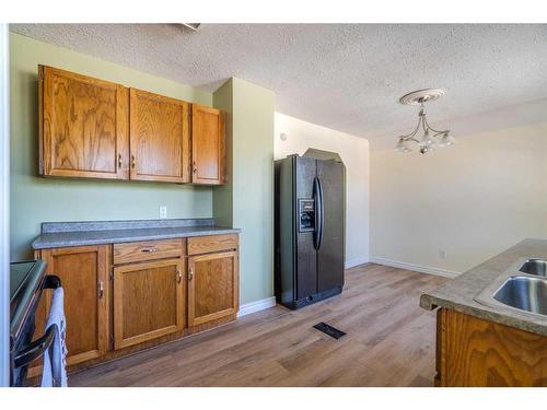 5220 46 Street, Lloydminster, AB - Indoor Photo Showing Kitchen With Double Sink