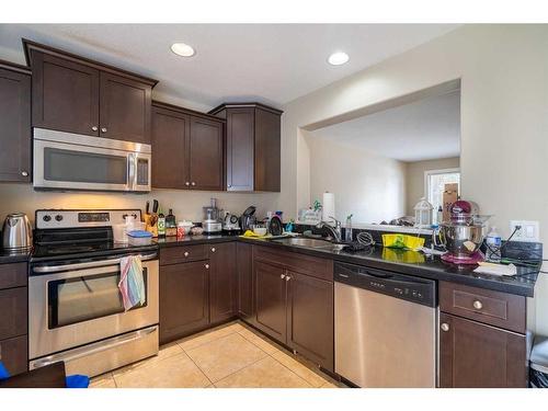 2-4008 41 Avenue, Lloydminster, SK - Indoor Photo Showing Kitchen With Stainless Steel Kitchen With Double Sink