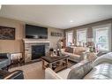 25-2715 73 Avenue, Lloydminster, AB  - Indoor Photo Showing Living Room With Fireplace 