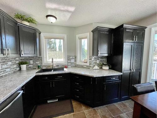 1837 10 Avenue, Wainwright, AB - Indoor Photo Showing Kitchen With Double Sink