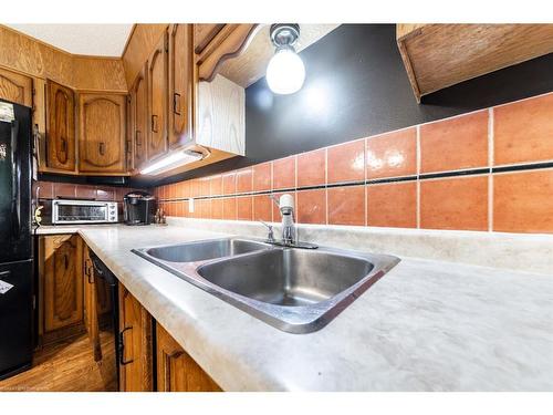 304 6 Avenue, Paradise Hill, SK - Indoor Photo Showing Kitchen With Double Sink