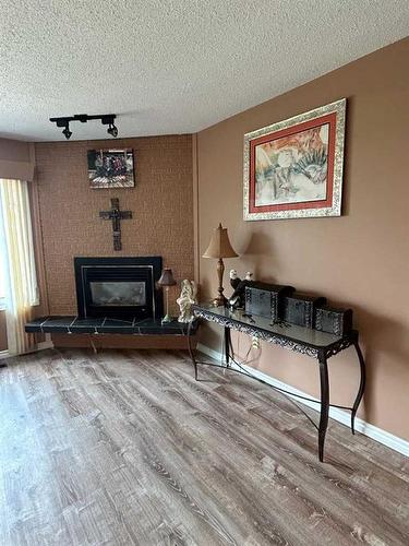 49425 Hwy 870, Innisfree, AB - Indoor With Fireplace