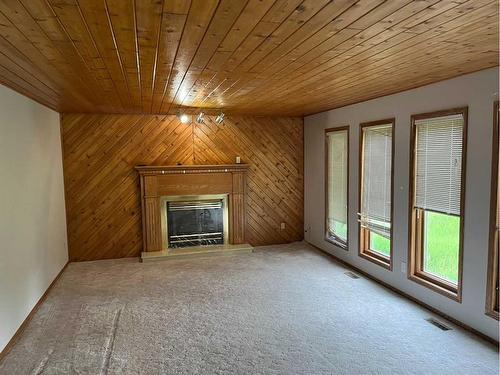 Ne 24-44-24W3 & Nw 24-44-24W3, Rural, SK - Indoor With Fireplace