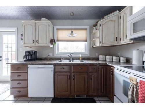 5307 26 Street Close, Lloydminster, AB - Indoor Photo Showing Kitchen With Double Sink