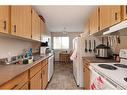 302-5607 31 Street, Lloydminster, AB  - Indoor Photo Showing Kitchen With Double Sink 