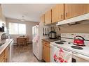 302-5607 31 Street, Lloydminster, AB  - Indoor Photo Showing Kitchen 