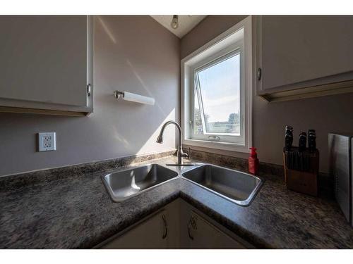 5205 50 Street, Kitscoty, AB - Indoor Photo Showing Kitchen With Double Sink