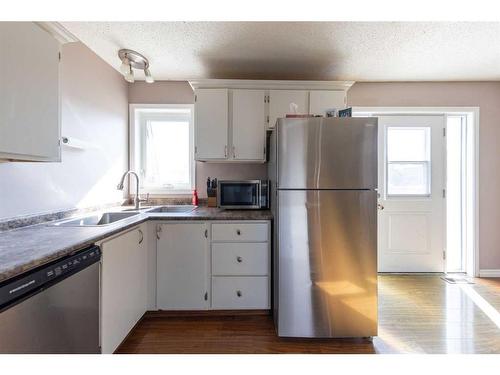 5205 50 Street, Kitscoty, AB - Indoor Photo Showing Kitchen With Stainless Steel Kitchen With Double Sink