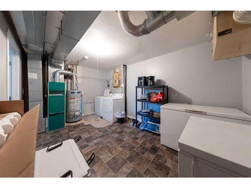 5205 50 Street, Kitscoty, AB - Indoor Photo Showing Laundry Room