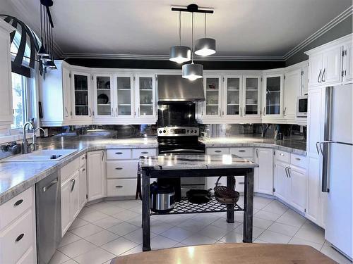 5132 48 Street, Mannville, AB - Indoor Photo Showing Kitchen With Double Sink