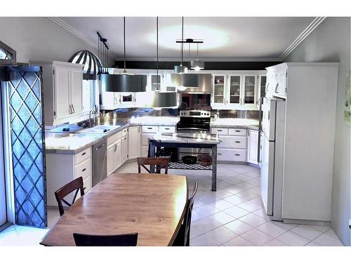 5132 48 Street, Mannville, AB - Indoor Photo Showing Kitchen With Double Sink