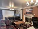 5132 48 Street, Mannville, AB  - Indoor Photo Showing Living Room With Fireplace 