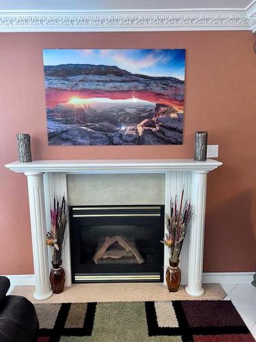 5132 48 Street, Mannville, AB - Indoor Photo Showing Living Room With Fireplace