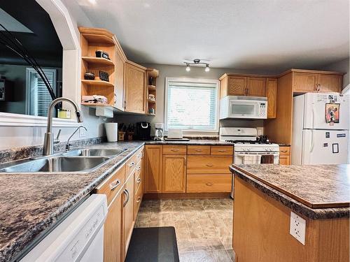 114 1St Street West, Lashburn, SK - Indoor Photo Showing Kitchen With Double Sink