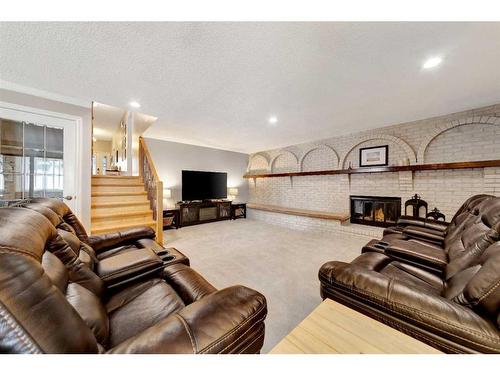 601 19 Street, Wainwright, AB - Indoor Photo Showing Living Room With Fireplace