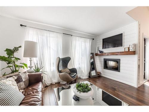 7109 39A Street, Lloydminster, AB - Indoor Photo Showing Living Room With Fireplace