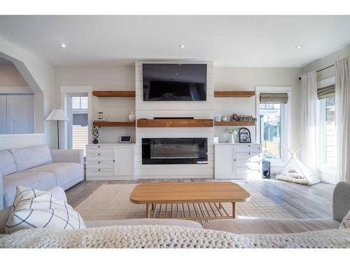 1703 59B Avenue, Lloydminster, AB - Indoor Photo Showing Living Room With Fireplace