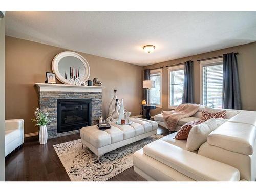 5705 21 Street, Lloydminster, AB - Indoor Photo Showing Living Room With Fireplace