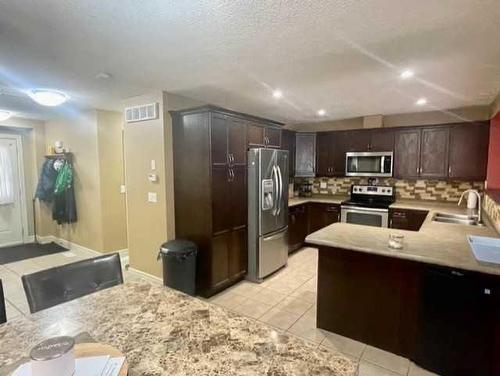 B-820 28 Street, Wainwright, AB - Indoor Photo Showing Kitchen With Double Sink With Upgraded Kitchen