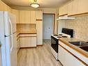 1130 15 Street, Wainwright, AB  - Indoor Photo Showing Kitchen With Double Sink 