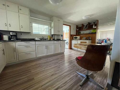 4631 51 Street, Mannville, AB - Indoor Photo Showing Kitchen With Double Sink