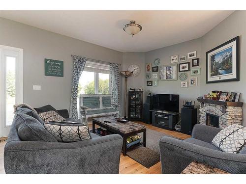 Ne 33-48-25 W3 R.M. Of Wilton, Rural, SK - Indoor Photo Showing Living Room With Fireplace