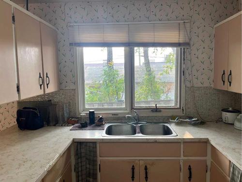 5741 45 Street, Lloydminster, AB - Indoor Photo Showing Kitchen With Double Sink