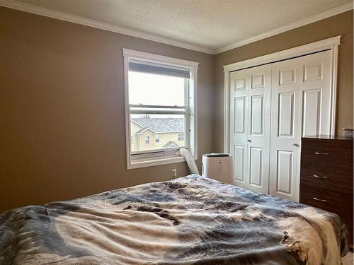 302A-4520 51 Street, Vermilion, AB - Indoor Photo Showing Bedroom