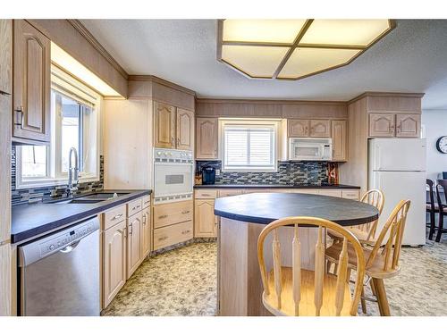 4845 50 Avenue, Kitscoty, AB - Indoor Photo Showing Kitchen With Double Sink