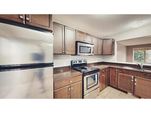 11-1809 47 Avenue, Lloydminster, SK - Indoor Photo Showing Kitchen With Stainless Steel Kitchen