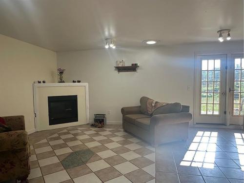 64028 Twp 550, Rural Two Hills No. 21, County Of, AB - Indoor Photo Showing Living Room With Fireplace