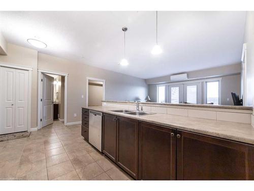 303-4102 69 Avenue, Lloydminster, AB - Indoor Photo Showing Kitchen With Double Sink