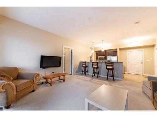 303-4102 69 Avenue, Lloydminster, AB - Indoor Photo Showing Living Room