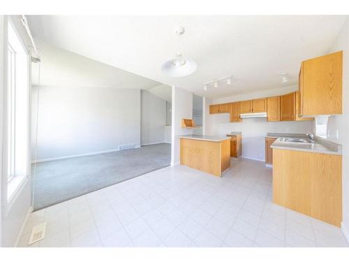 17-6313 39 Street, Lloydminster, AB - Indoor Photo Showing Kitchen With Double Sink